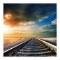 Preview: Eisenbahnschienen führen in malerischen Sonnenuntergang, Freiheit & Abenteuer. Preview: Eisenbahnschienen führen in malerischen Sonnenuntergang, Freiheit & Abenteuer.
