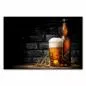 Preview: Glas Bier mit Schaumkrone, Flasche, Ähren auf Holztisch. Preview: Glas Bier mit Schaumkrone, Flasche, Ähren auf Holztisch.