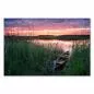 Preview: Holzboot am Seeufer, farbenfroher Sonnenuntergang, Spiegelung im Wasser. Preview: Holzboot am Seeufer, farbenfroher Sonnenuntergang, Spiegelung im Wasser.