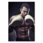 Preview: Muskulöser Boxer in Kampfhaltung, weiße Boxhandschuhe, konzentrierter Blick. Preview: Muskulöser Boxer in Kampfhaltung, weiße Boxhandschuhe, konzentrierter Blick.