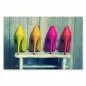 Preview: Vier bunte High Heels in Gelb, Orange, Pink und Rot stehen auf einer weißen Holzbank vor einer Vintage-Holzwand. Preview: Vier bunte High Heels in Gelb, Orange, Pink und Rot stehen auf einer weißen Holzbank vor einer Vintage-Holzwand.