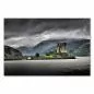 Preview: Eilean Donan Castle auf einer Insel, verbunden durch eine Steinbrücke, dramatisch unter dem Himmel. Preview: Eilean Donan Castle auf einer Insel, verbunden durch eine Steinbrücke, dramatisch unter dem Himmel.