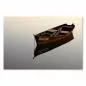 Preview: Ein kleines, altes Holzboot liegt ruhig auf dem Wasser und spiegelt sich im stillen See wider. Preview: Ein kleines, altes Holzboot liegt ruhig auf dem Wasser und spiegelt sich im stillen See wider.
