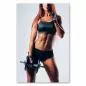 Preview: Trainierte Frau, Sixpack, rote Haare, posiert mit Hantel - athletischer Körper. Preview: Trainierte Frau, Sixpack, rote Haare, posiert mit Hantel - athletischer Körper.