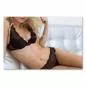 Preview: Nahaufnahme: Frau in Spitzendessous auf Sofa, Fokus auf Bauch & Unterwäsche. Preview: Nahaufnahme: Frau in Spitzendessous auf Sofa, Fokus auf Bauch & Unterwäsche.