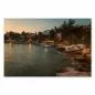 Preview: Idyllischer Hafen mit Booten und untergehender Sonne, taucht die Szenerie in warme Farben. Preview: Idyllischer Hafen mit Booten und untergehender Sonne, taucht die Szenerie in warme Farben.