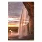Preview: Mächtiger Wasserfall in Island erstrahlt im warmen Licht der untergehenden Sonne. Preview: Mächtiger Wasserfall in Island erstrahlt im warmen Licht der untergehenden Sonne.