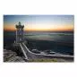 Preview: Ein malerischer Leuchtturm erstrahlt im warmen Licht des Sonnenuntergangs - ein magischer Moment am Meer. Preview: Ein malerischer Leuchtturm erstrahlt im warmen Licht des Sonnenuntergangs - ein magischer Moment am Meer.