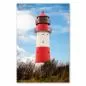 Preview: Ein rot-weisser Leuchtturm vor blauem Himmel - ein Symbol für Sicherheit und Orientierung. Preview: Ein rot-weisser Leuchtturm vor blauem Himmel - ein Symbol für Sicherheit und Orientierung.