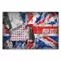 Preview: Stilvolle Frau mit Rock und Lederjacke vor einem Graffiti der britischen Flagge (Union Jack). Preview: Stilvolle Frau mit Rock und Lederjacke vor einem Graffiti der britischen Flagge (Union Jack).