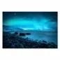 Preview: Leuchtend grüne und blaue Nordlichter tanzen am Himmel über einem felsigen Strand. Die Sterne funkeln hell und das Meer leuchtet im Schein der Aurora Borealis. Preview: Leuchtend grüne und blaue Nordlichter tanzen am Himmel über einem felsigen Strand. Die Sterne funkeln hell und das Meer leuchtet im Schein der Aurora Borealis.