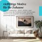 Preview: Stylisches Leinwandbild: Adrenalinrausch - Mountainbiker springt über Felsen. Wanddeko für Action- und Sportfans.
