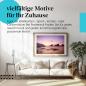 Preview: Dieses Leinwandbild mit dem Sonnenuntergang am Strand bringt Ruhe und Urlaubsfeeling in Ihr Zuhause.