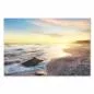Preview: Sonnenuntergang am Strand, warmes Licht, Wellen, einzelner Felsen im Meer. Preview: Sonnenuntergang am Strand, warmes Licht, Wellen, einzelner Felsen im Meer.