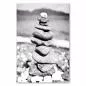 Preview: Ein Steinturm am Strand, eingefangen in einer zeitlosen Schwarz-Weiß-Fotografie – ein Symbol für Balance und Harmonie. Preview: Ein Steinturm am Strand, eingefangen in einer zeitlosen Schwarz-Weiß-Fotografie – ein Symbol für Balance und Harmonie.