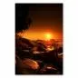 Preview: Goldener Sonnenuntergang über dem Meer, Palmen am Strand und Felsen im Vordergrund. Preview: Goldener Sonnenuntergang über dem Meer, Palmen am Strand und Felsen im Vordergrund.