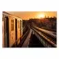 Preview: New Yorker U-Bahn, Sonnenaufgang, Skyline von Manhattan im Hintergrund. Preview: New Yorker U-Bahn, Sonnenaufgang, Skyline von Manhattan im Hintergrund.