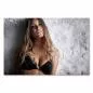 Preview: Attraktive Frau, blonde Haare, schwarze Unterwäsche, graue Wand, sinnlicher Blick. Preview: Attraktive Frau, blonde Haare, schwarze Unterwäsche, graue Wand, sinnlicher Blick.