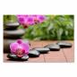 Preview: Schwarze Zen-Steine auf Bambusmatte, pinke Orchidee, Ruhe & Harmonie.