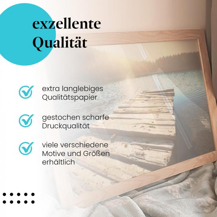 Gerahmtes Wandbild "Sonnenuntergang am See" in verschiedenen Größen.