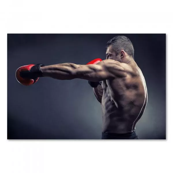 Muskulöser Boxer beim Training, Boxhandschuhe, demonstriert Schlagkraft. Muskulöser Boxer beim Training, Boxhandschuhe, demonstriert Schlagkraft.