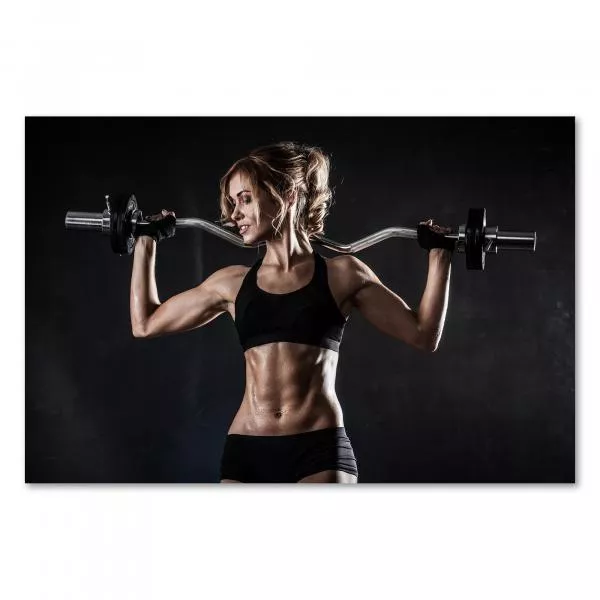Eine durchtrainierte Frau steht im Fitnessstudio und hebt konzentriert eine Langhantel. Ihr verschwitzter Körper und ihr fokussierter Blick zeugen von hartem Training. Eine durchtrainierte Frau steht im Fitnessstudio und hebt konzentriert eine Langhantel. Ihr verschwitzter Körper und ihr fokussierter Blick zeugen von hartem Training.