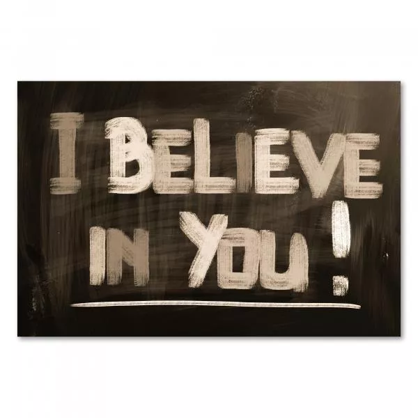Schwarze Tafel mit der weissen Kreideschrift: "I Believe in You !". Schwarze Tafel mit der weissen Kreideschrift: "I Believe in You !".