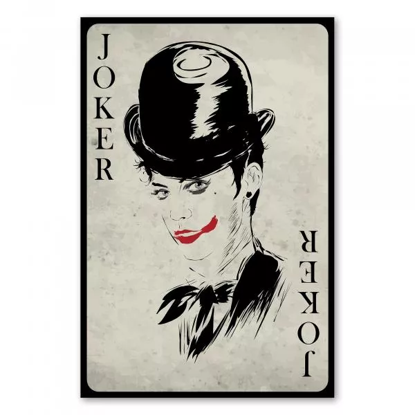 Spielkarte Joker mit androgyn wirkender Person im Hut und mit Joker-Make-up. Spielkarte Joker mit androgyn wirkender Person im Hut und mit Joker-Make-up.