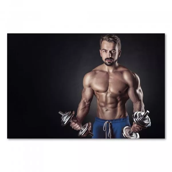 Durchtrainierter Sportler, Muskeln, Hanteln in den Händen - Fitness. Durchtrainierter Sportler, Muskeln, Hanteln in den Händen - Fitness.