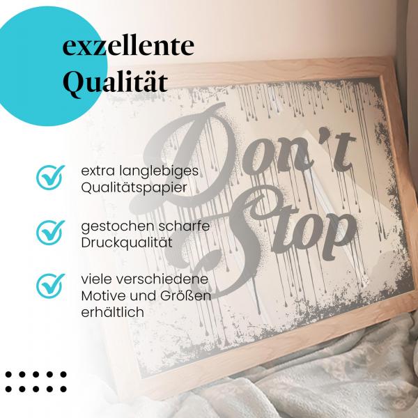 Gerahmtes Wandbild "Inspirierender Schriftzug: Don't Stop" – für alle, die niemals aufgeben.