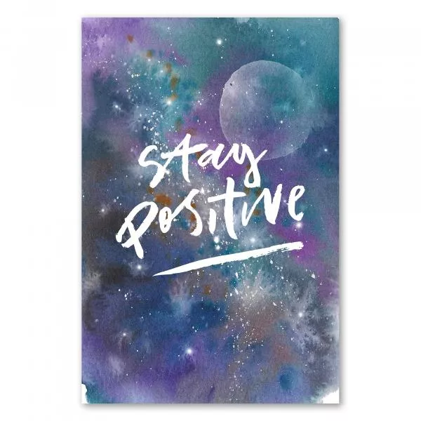 "Stay Positive!" - Motivierender Schriftzug vor buntem Hintergrund, der an Sternenhimmel erinnert. "Stay Positive!" - Motivierender Schriftzug vor buntem Hintergrund, der an Sternenhimmel erinnert.