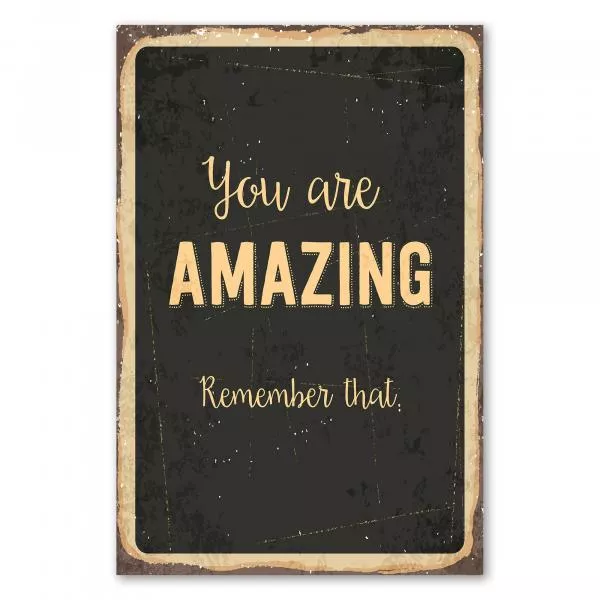 Inspirierendes Vintage Schild mit der Aufschrift "You are AMAZING.Remember that."auf dunklem Hintergrund. Inspirierendes Vintage Schild mit der Aufschrift "You are AMAZING.Remember that."auf dunklem Hintergrund.